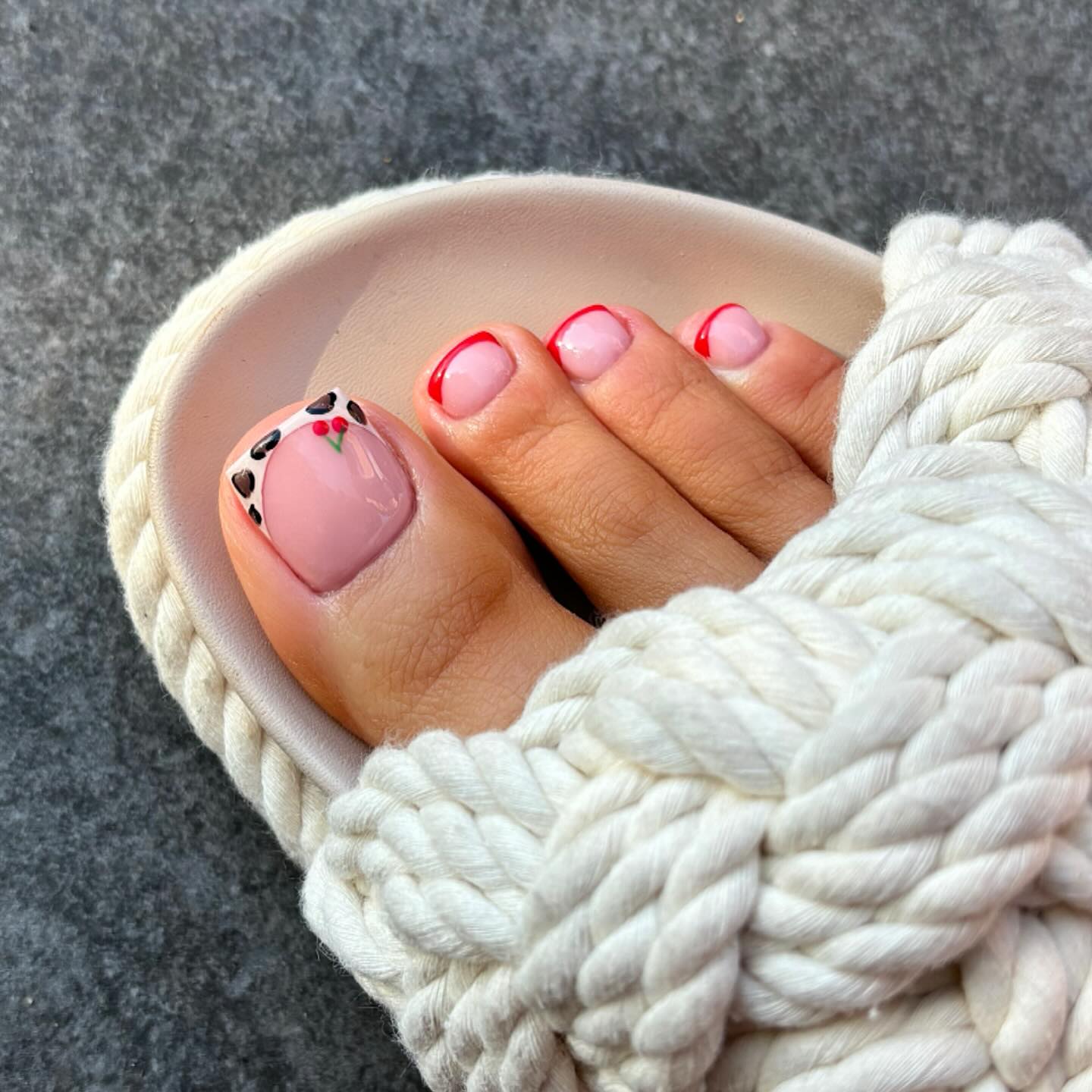 Microfruit pedicure with cherries and cowprint French tips