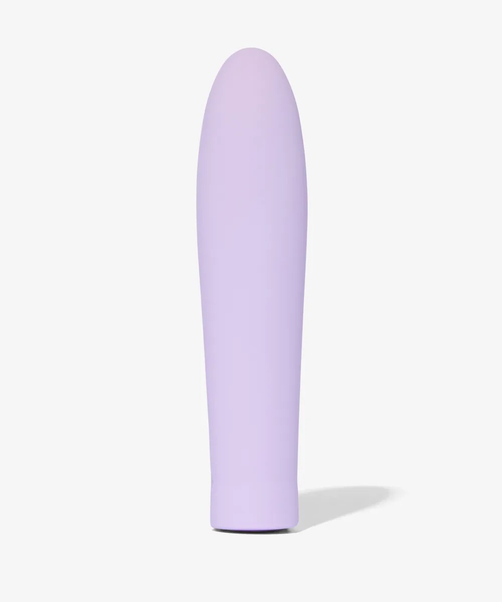 Smile Makers vibrator in a lilac shade on a white background and standing up